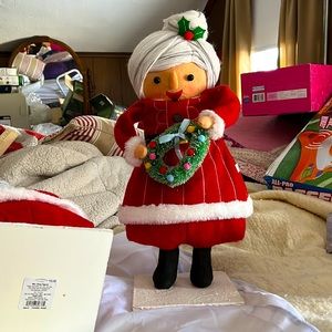 2 Mrs. Santa Clause figurines.